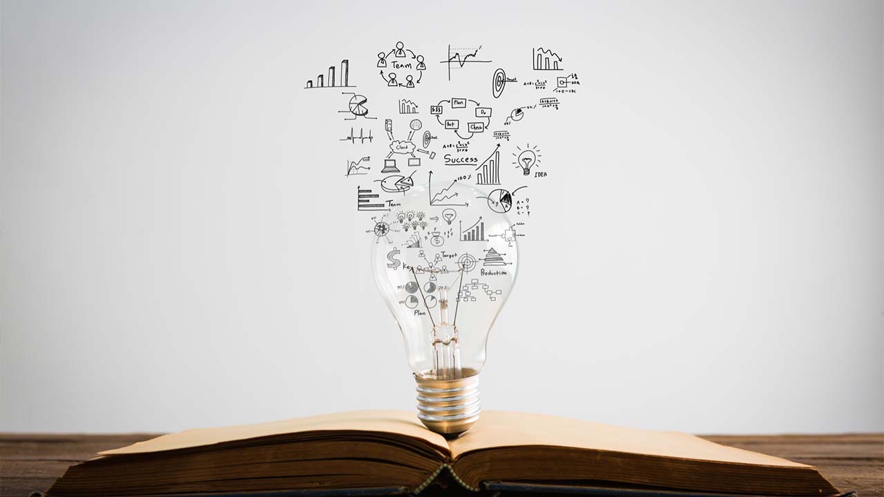 Bulb on book, educational